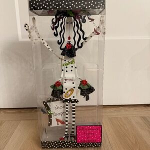 WOMEN'S GIFT UNIQUE :DOLLY MAMA “SHOE SHOPPER" METAL LADY DOLL-NEW IN BOX